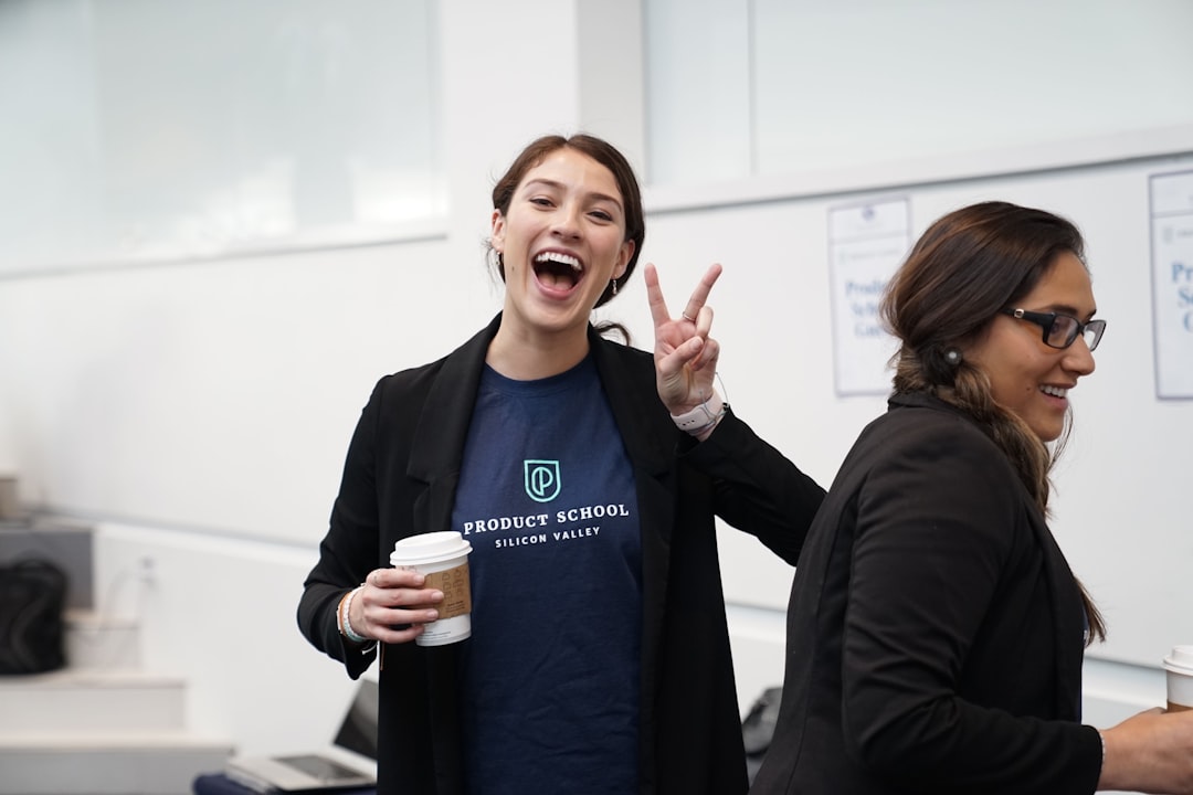 woman-wearing-suit-making-hand-peace-sign-urvhqiv-4